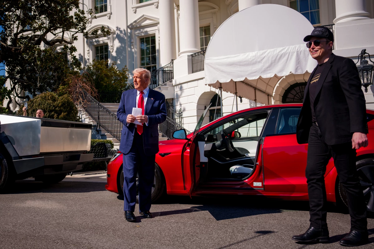 President Trump and Musk inspect Tesla vehicles in front of the White House on March 11, 2025.