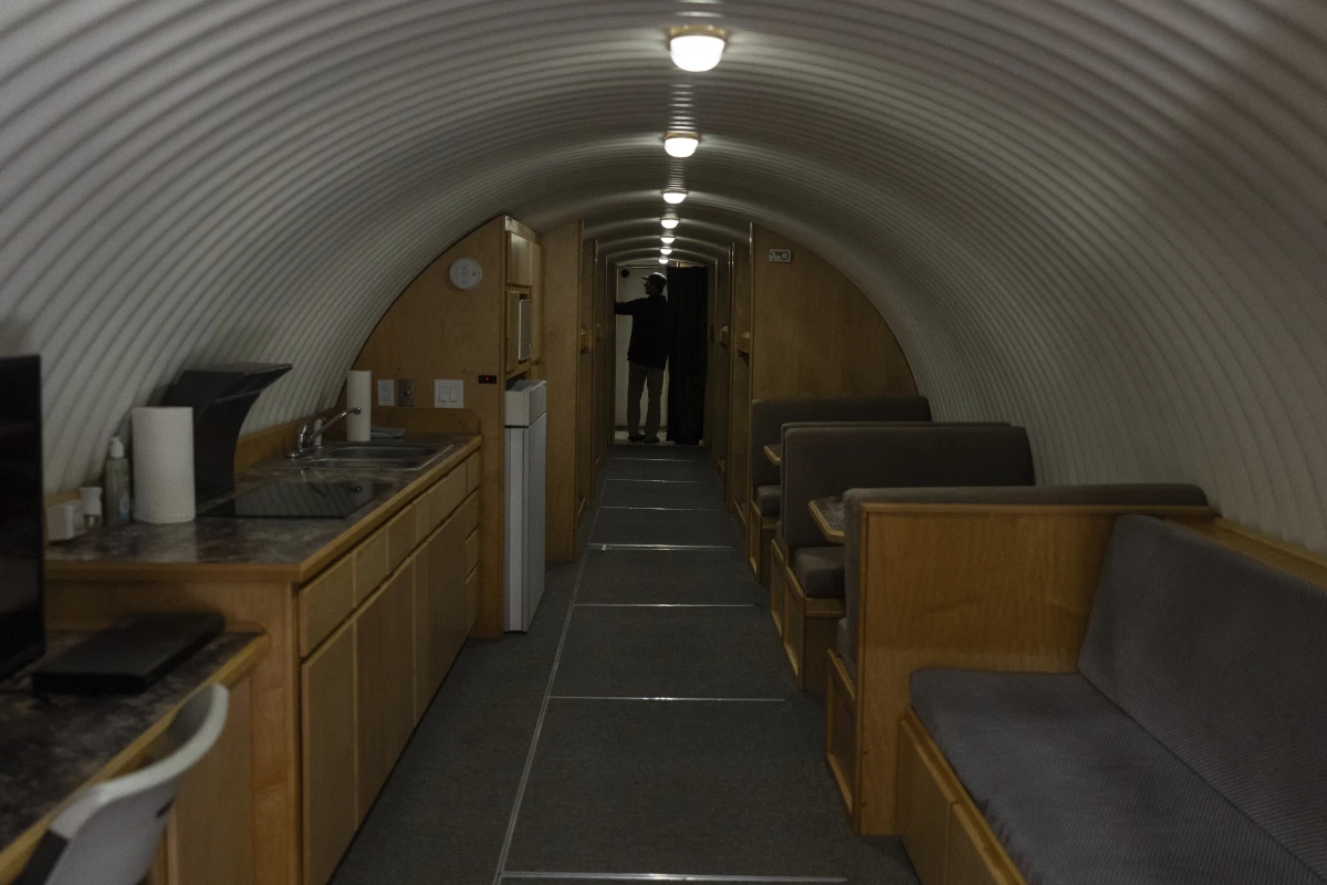 The owner, who asked not to be identified because of concerns about his privacy, turns on the lights in his underground shelter in an undisclosed Southern California city, on Dec. 16.