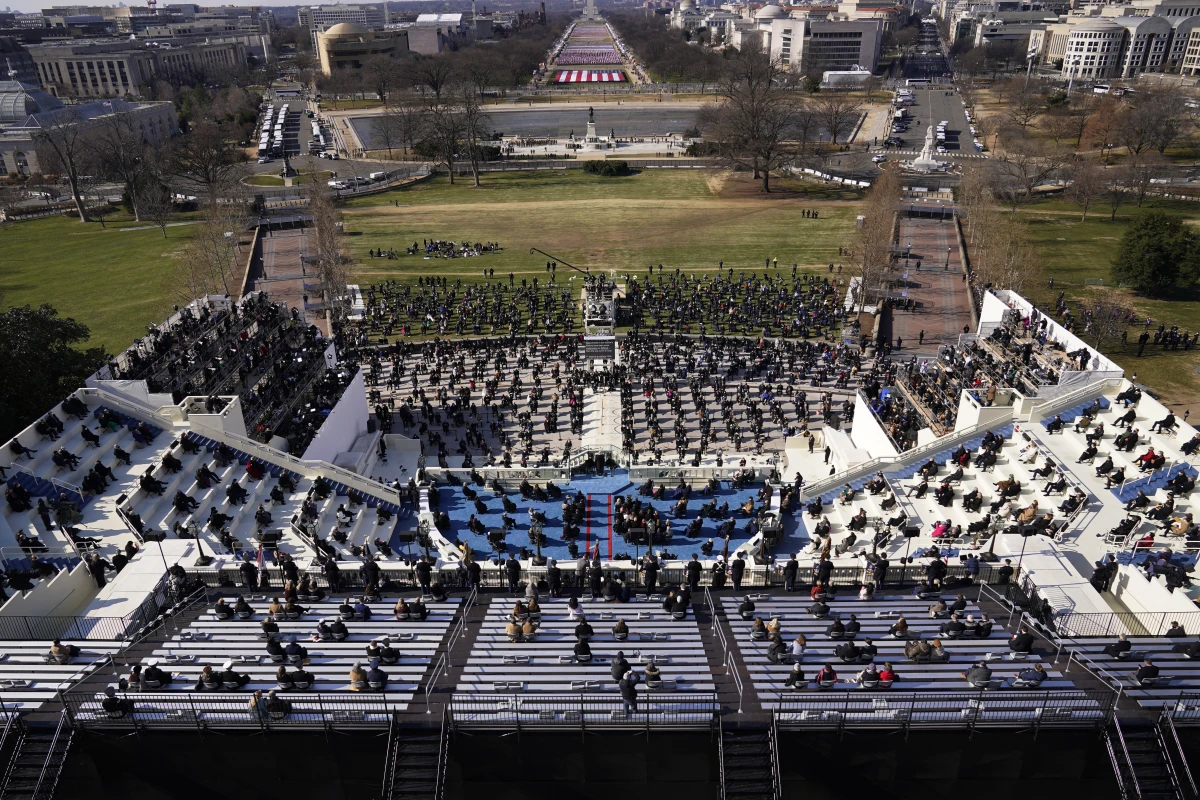 Guests and spectators attend the 59th Presidential Inauguration on the West Front of the U.S. Capitol on Jan. 20, 2021, in Washington, D.C.