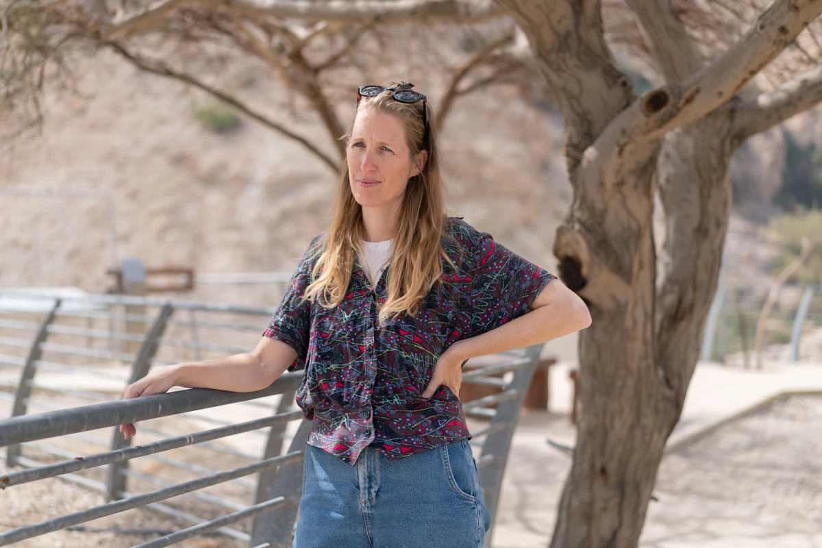 Noam Erely, the principal of the temporary elementary school for the displaced residents of Be'eri, stands outside a school set up in a complex usually used to teach visiting classes about nature in the Dead Sea area.