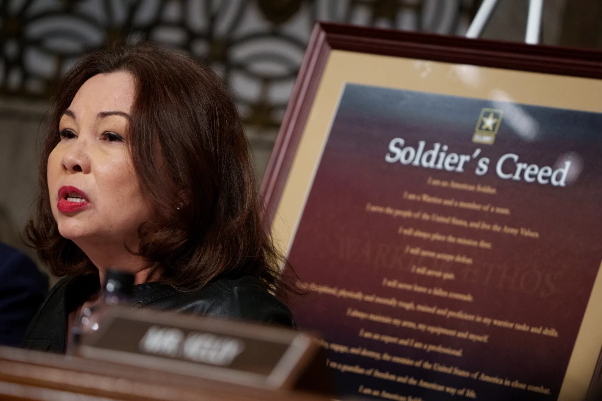 The Soldiers Creed is displayed behind Sen. Tammy Duckworth, D-Ill., as she questions Pete Hegseth during a Senate Armed Services confirmation hearing on Capitol Hill on Jan. 14.