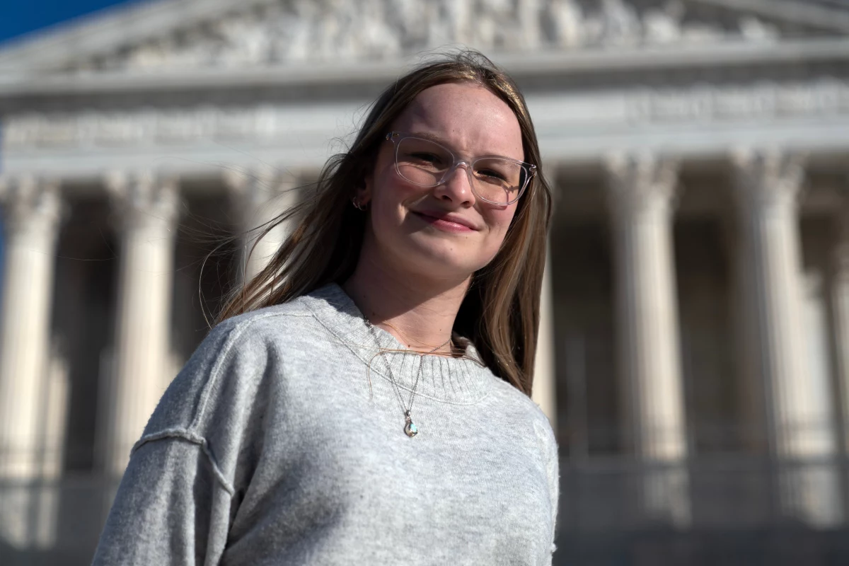 Becky Pepper-Jackson, 15, poses Sunday for a photograph outside of the U.S. Supreme Court in Washington. 