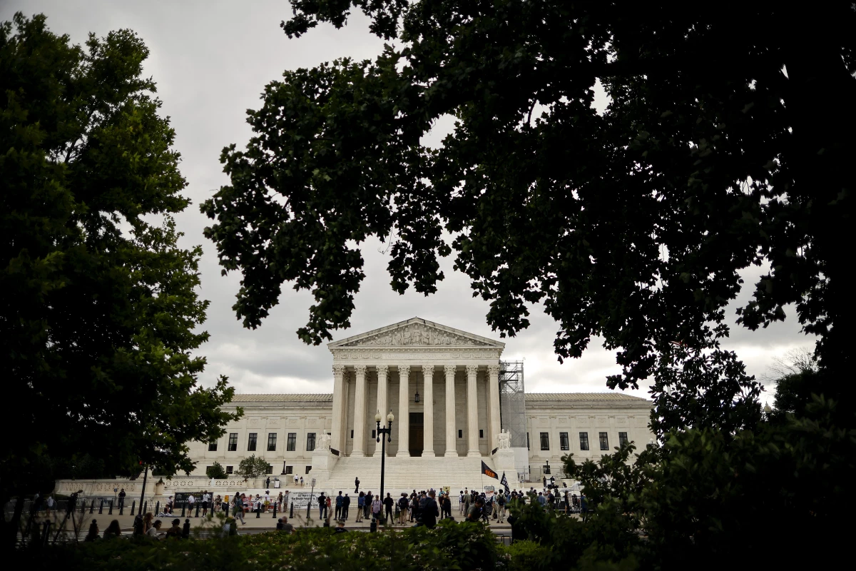 People gather outside the U.S. Supreme Court.
