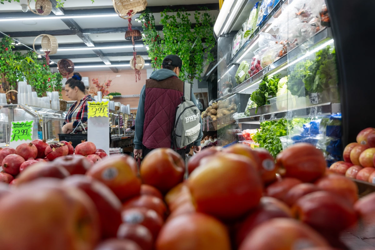 People shop for food in a Brooklyn neighborhood that has a large immigrant population on October 16, 2023 in New York City.
