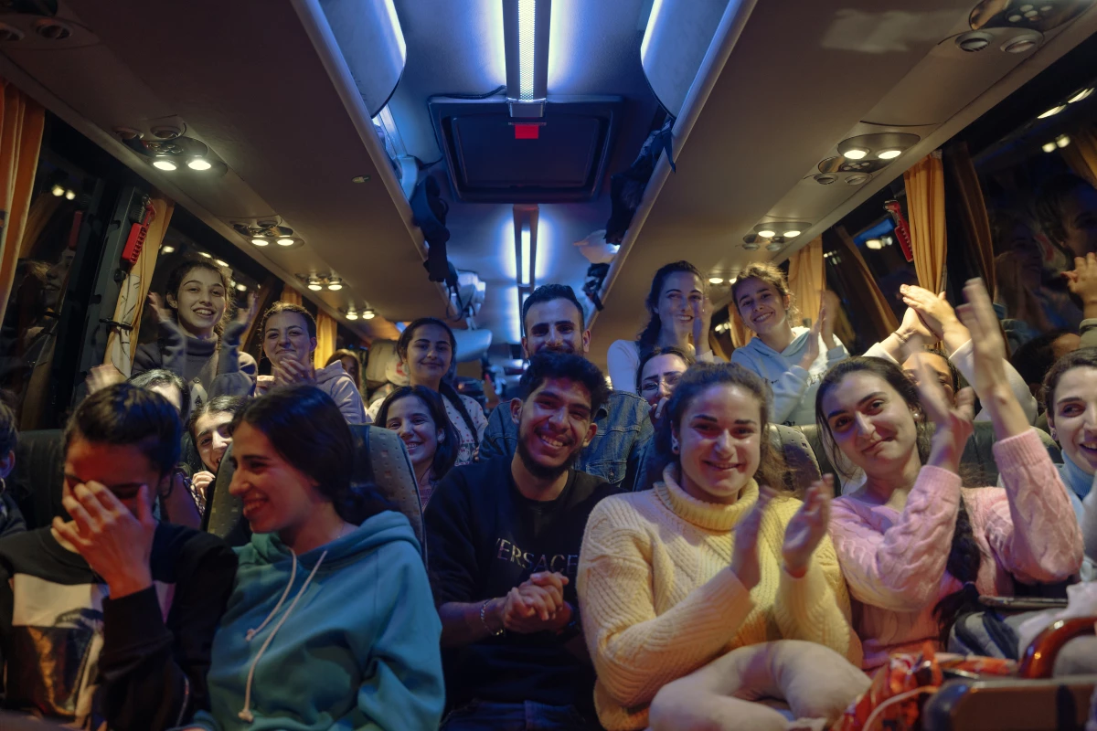 Evacuated Druze students celebrated their evacuation to safety on buses after Alawites were targeted in revenge attacks by Sunni Arab militants, March 10.