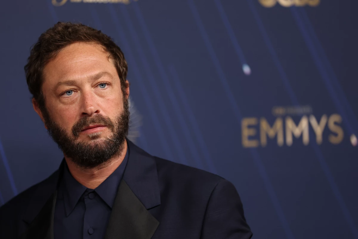 The Bear star Ebon Moss-Bachrach arrives at the Emmys.