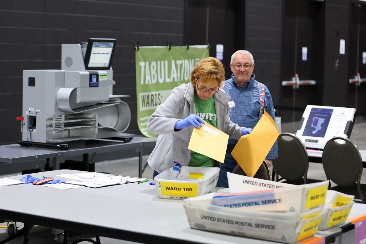 Workers count ballots at the Baird Center in Milwaukee, Wisconsin on Tuesday.