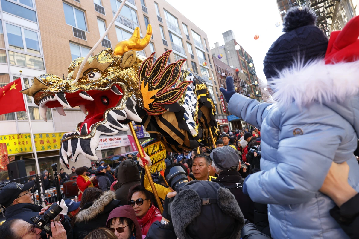People attend the annual Lunar New Year parade in New York City's Chinatown on Feb. 25, 2024.