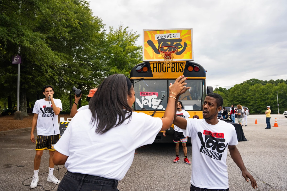 Ahead of the game, When We All Vote organizers also registered attendees in the parking lot of the Gateway Center Arena.