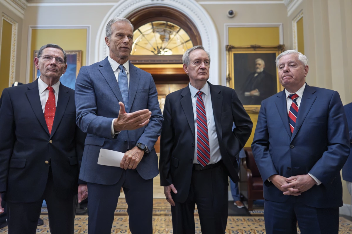 Senate Majority Leader John Thune, R-S.D., center, joined from left by, Sen. John Barrasso, R-Wyo., the GOP whip, Mike Crapo, R-Idaho, and Budget Committee Chairman Lindsey Graham, R-S.C., speaks after Senate passage of the 'Big Beautiful Bill.' Millions are estimated to lose health care if the bill becomes law.