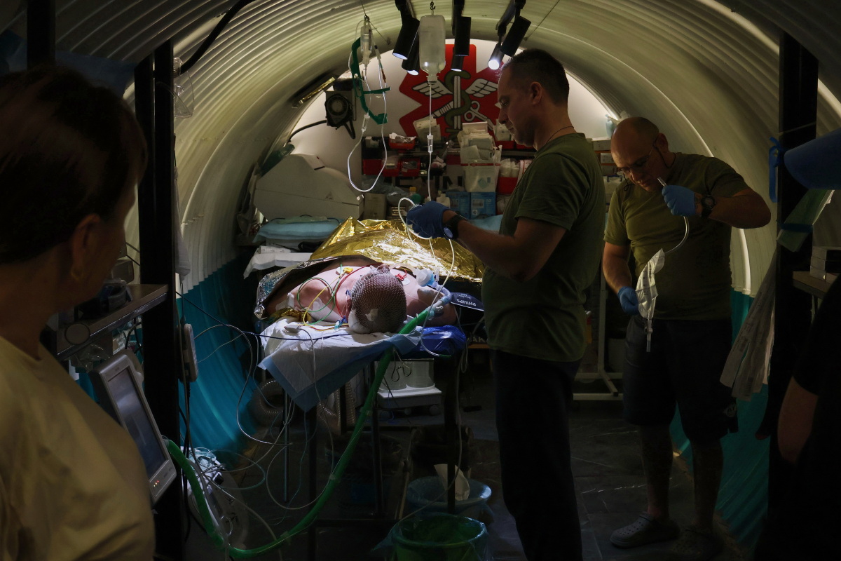 Drones buzz overhead, troops hunker underground in Ukraine's hellish kill zone