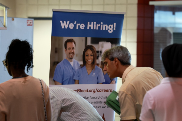 Job seekers attend a job fair in Sunrise, Fl., on June 26, 2024. Employers added only 114,000 jobs last month, well below expectations, raising fears about the economy.