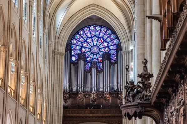 This photograph shows the stained glass Rose Window of the Notre Dame cathedral in Paris.