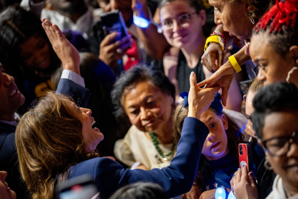 Vice President Harris shakes hands during an Aug. 6 rally in Philadelphia where she introduced her running mate, Minnesota Gov. Tim Walz.