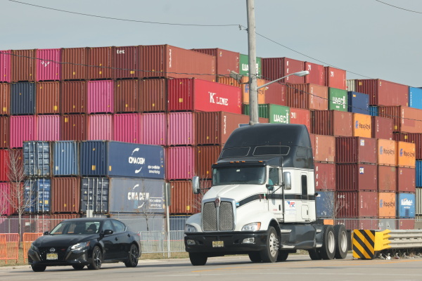 Shipping containers are stacked together at the Port of Newark in Newark, New Jersey, on Oct. 4.