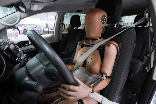 A THOR-5F female crash test dummy is shown in a driver's seat at Humanetics in Farmington Hills, Mich., June 10, 2025.
