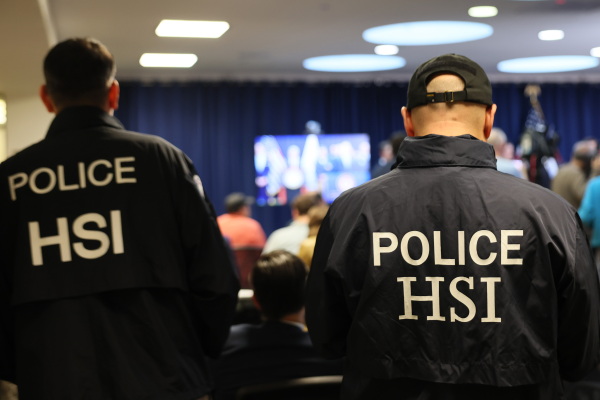 Members of Homeland Security Investigations listen as FBI Director Kash Patel speaks during a press conference on Oct. 23, 2025 in New York City.