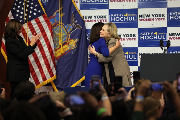 Vice President Kamala Harris claps as Gov. Kathy Hochul and Secretary Hillary Rodham Clinton embrace at the conclusion of a New York Women “Get Out The Vote” rally on November 03, 2022.