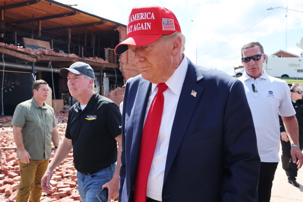 Former President Donald Trump prepares to leave after visiting Chez What Furniture store that was damaged during Hurricane Helene on Sept. 30, 2024 in Valdosta, Ga. Trump met with local officials, first responders, and residents who were impacted by the storm.