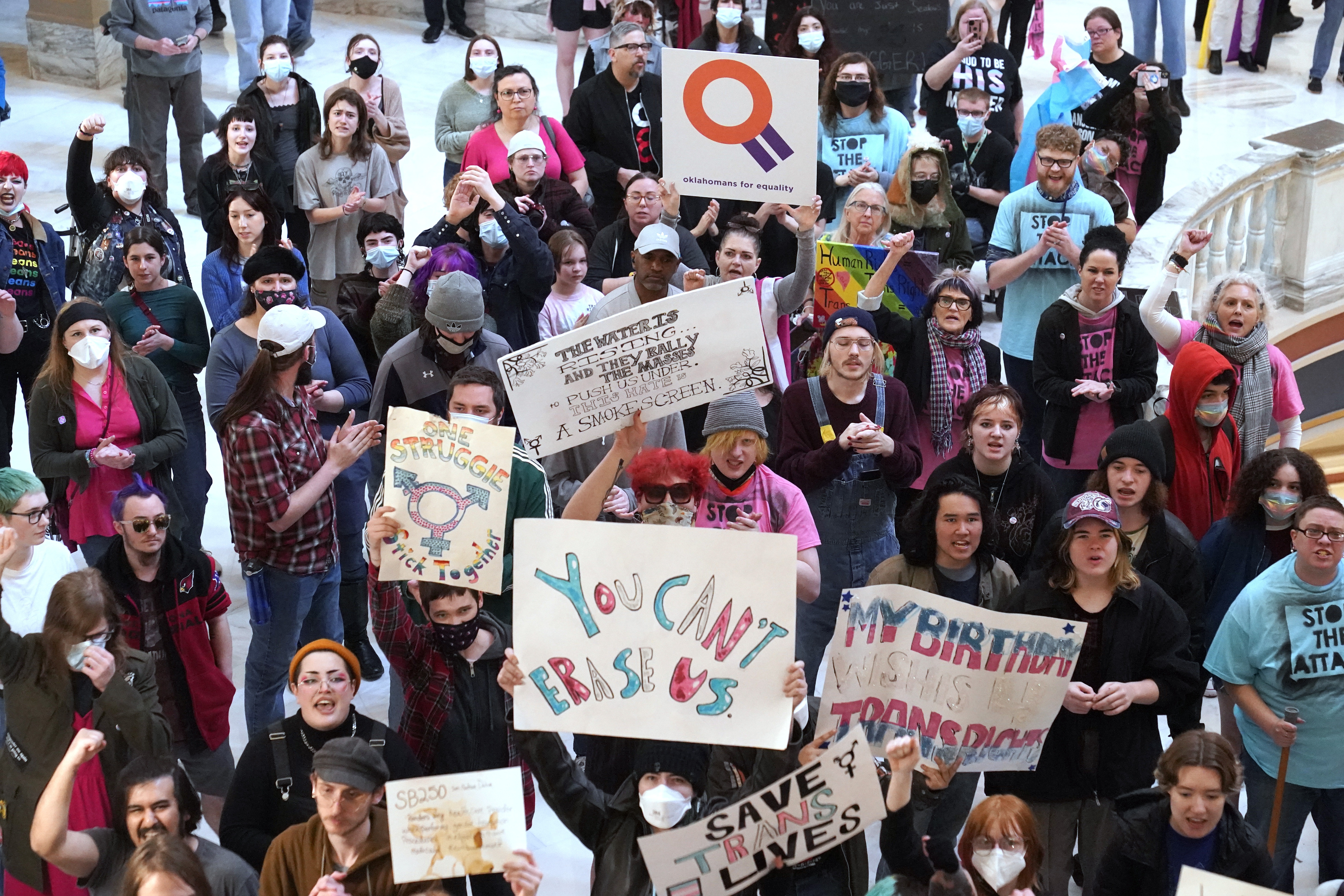 Trans-rights activists protest outside the House chamber at the Oklahoma state capitol before the State of the State address, Feb. 6, 2023, in Oklahoma City. Oklahoma and 25 other states have anti-trans laws on the books. (AP)