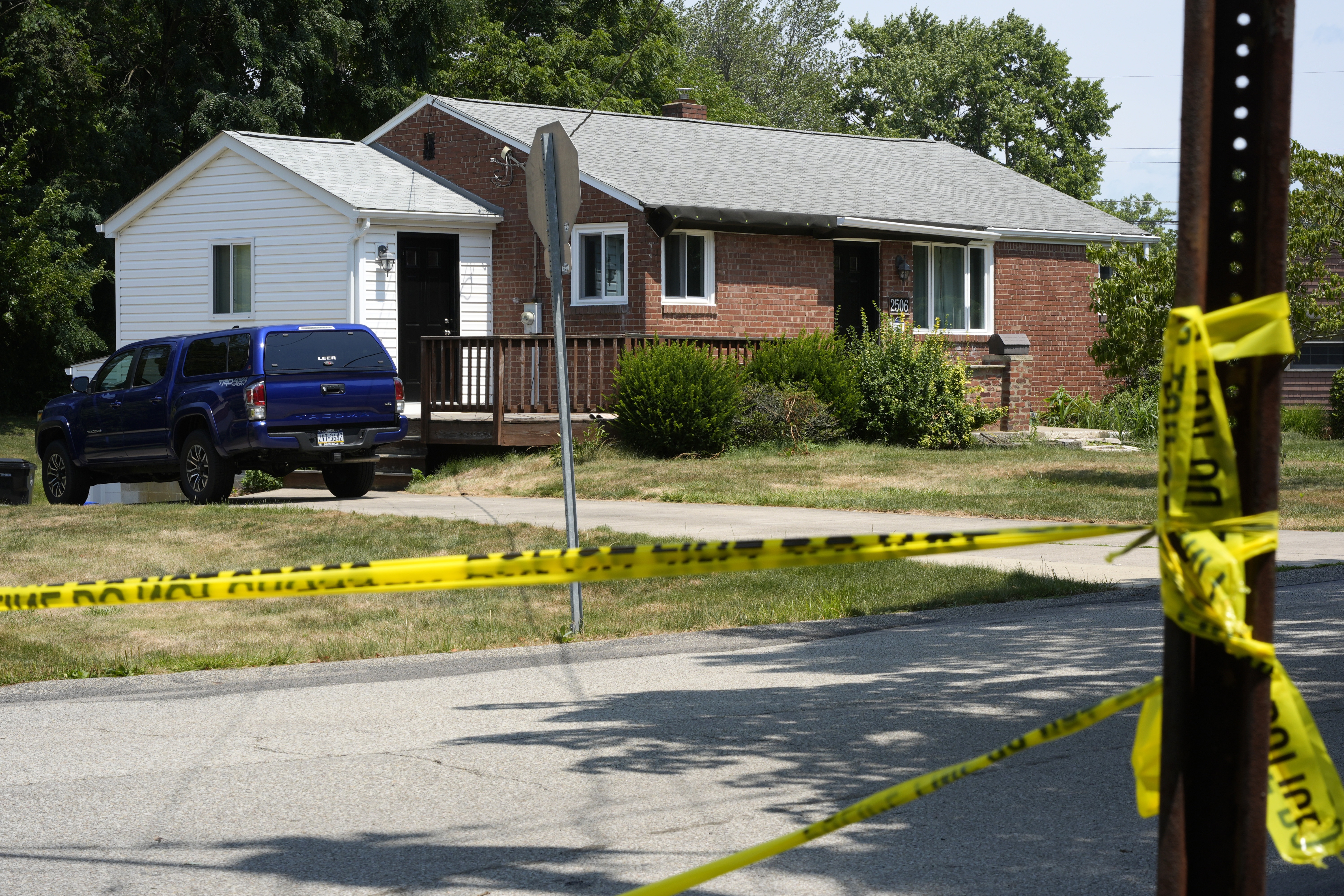 Police continue to block roads around the home of Thomas Matthew Crooks in Bethel Park, Pa., on Sunday, as the FBI continues its investigation into the attempted assassination of former President Donald Trump. (AFP via Getty Images)