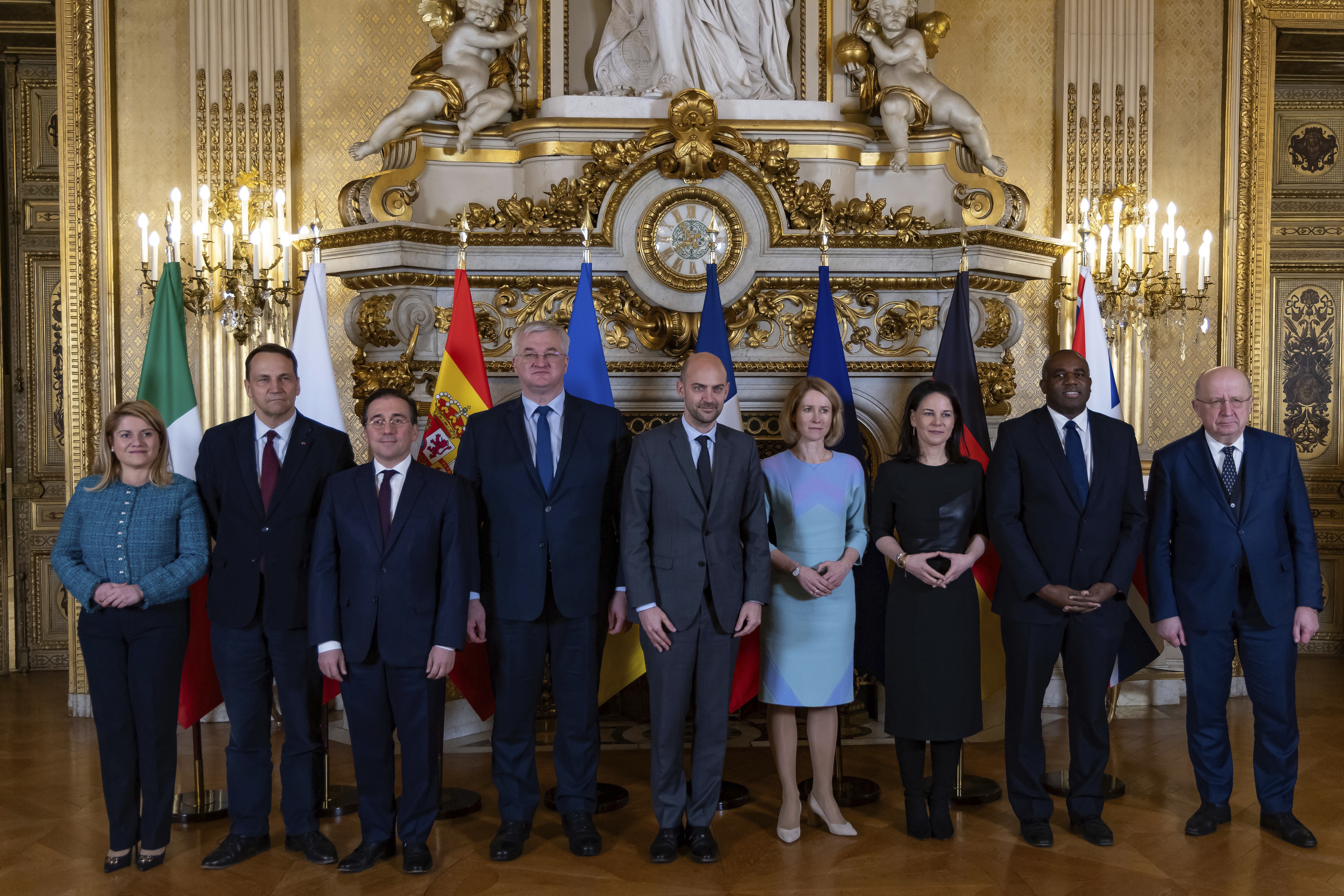 Leaders from Italy, Poland, Spain, Ukraine, France, Germany and the EU pose for a group photo during a meeting on European defense and Ukraine, at the Quai d'Orsay in Paris on Feb. 12. (Pool EPA)