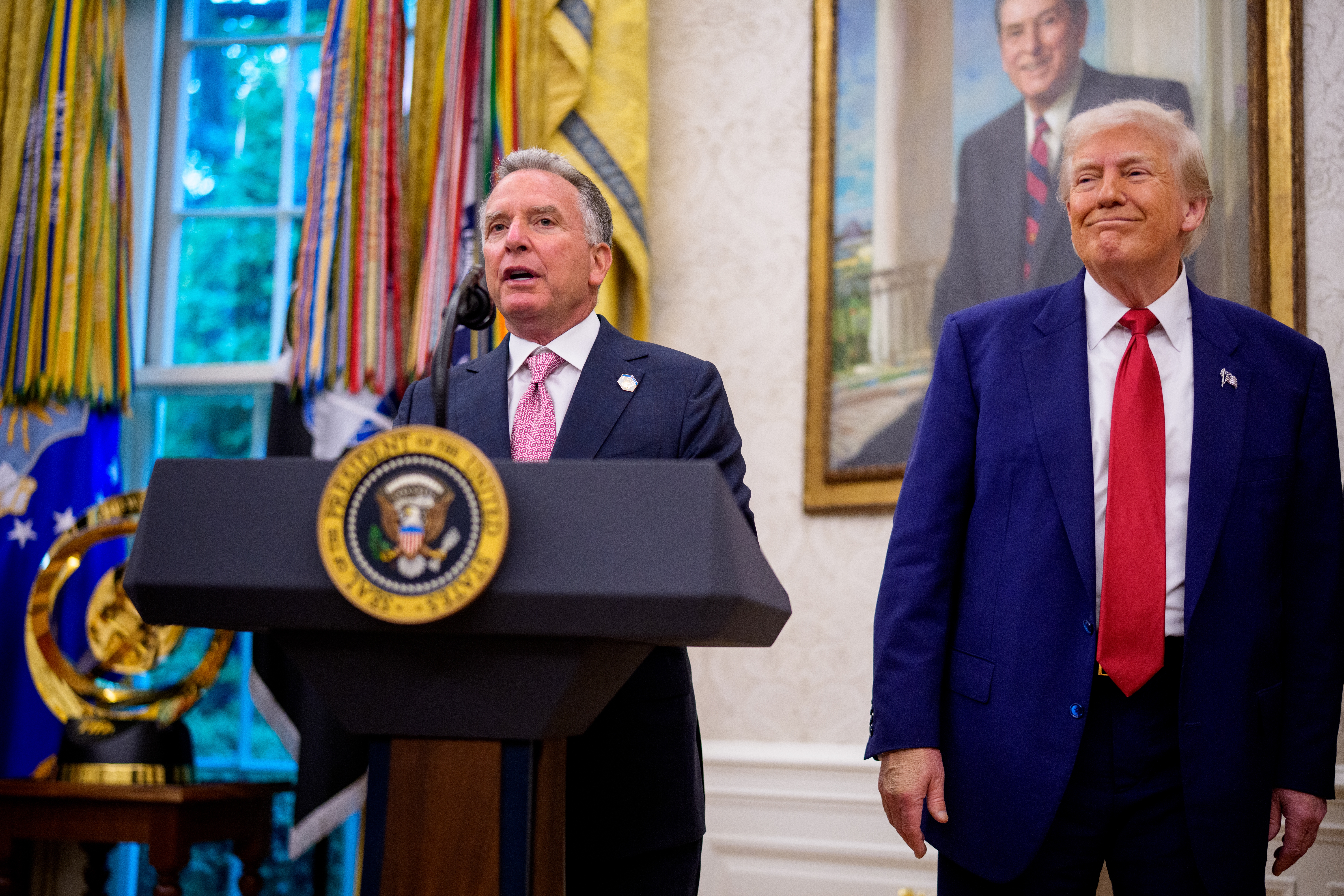 Steve Witkoff, flanked by President Trump, speaks at the White House on May 28.