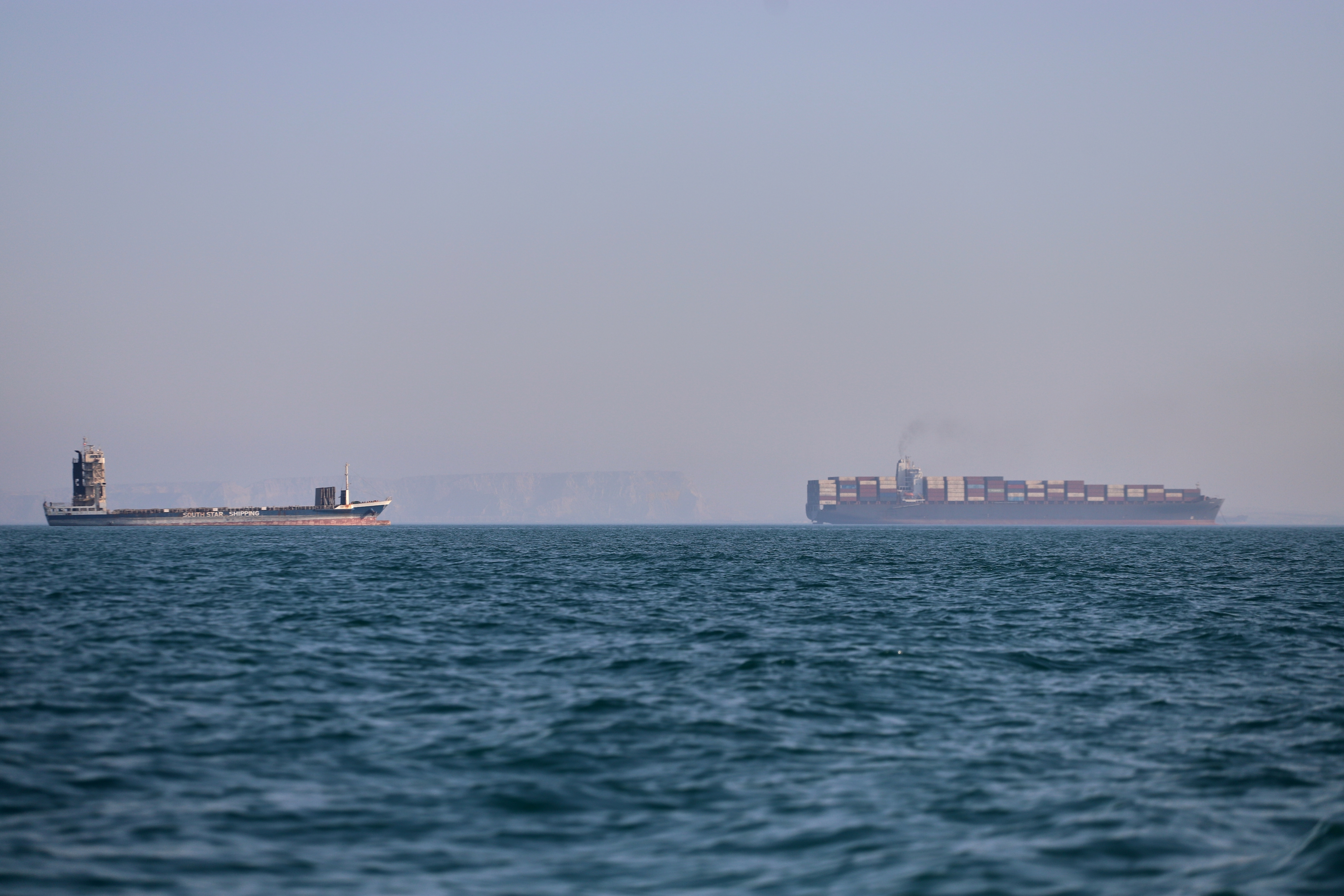2 ships are hit in the latest attacks in the Strait of Hormuz, the U.K. military says