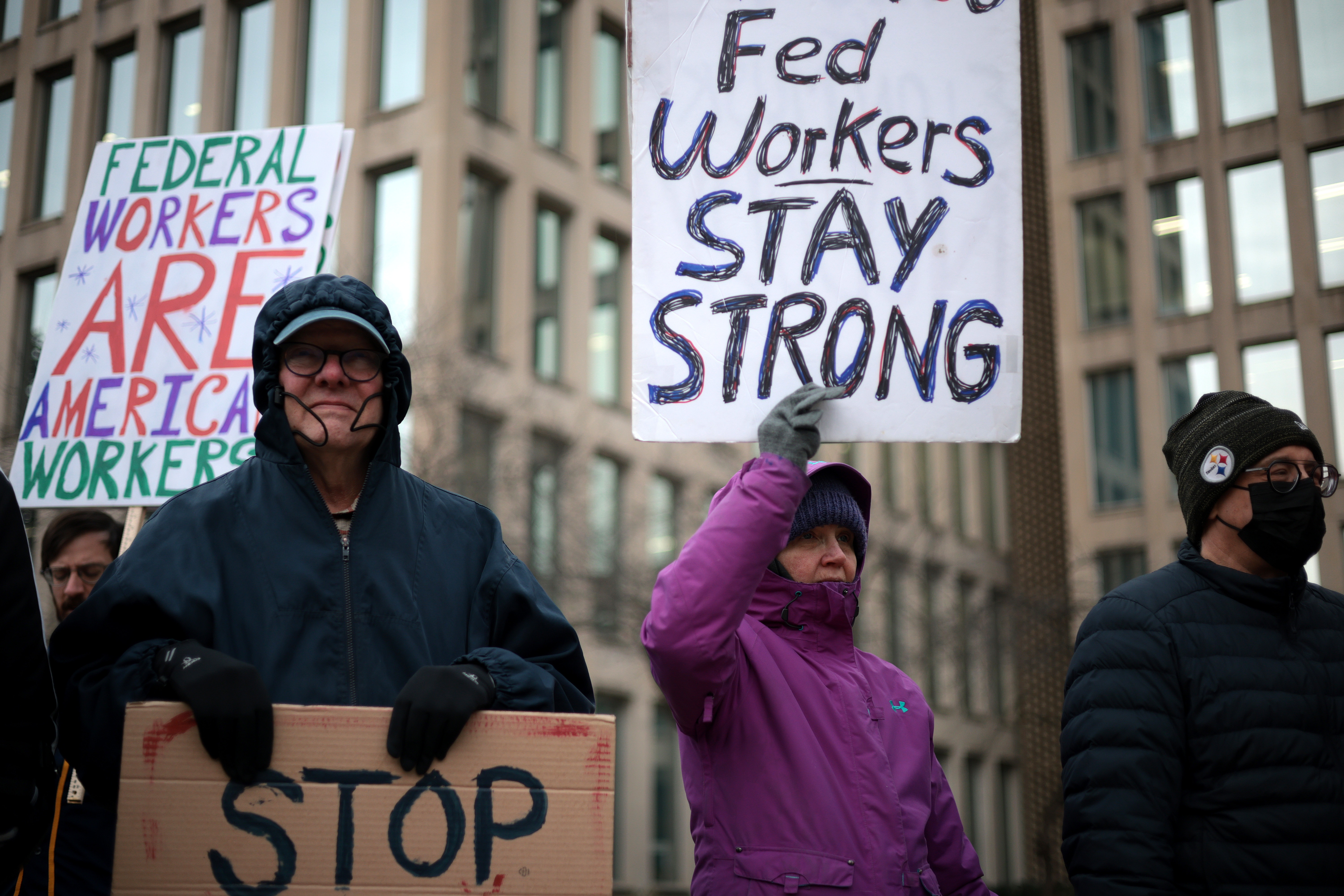 Protesters rally outside of the headquarters of the U.S. Office of Personnel Management on February 5, 2025 in Washington, D.C.