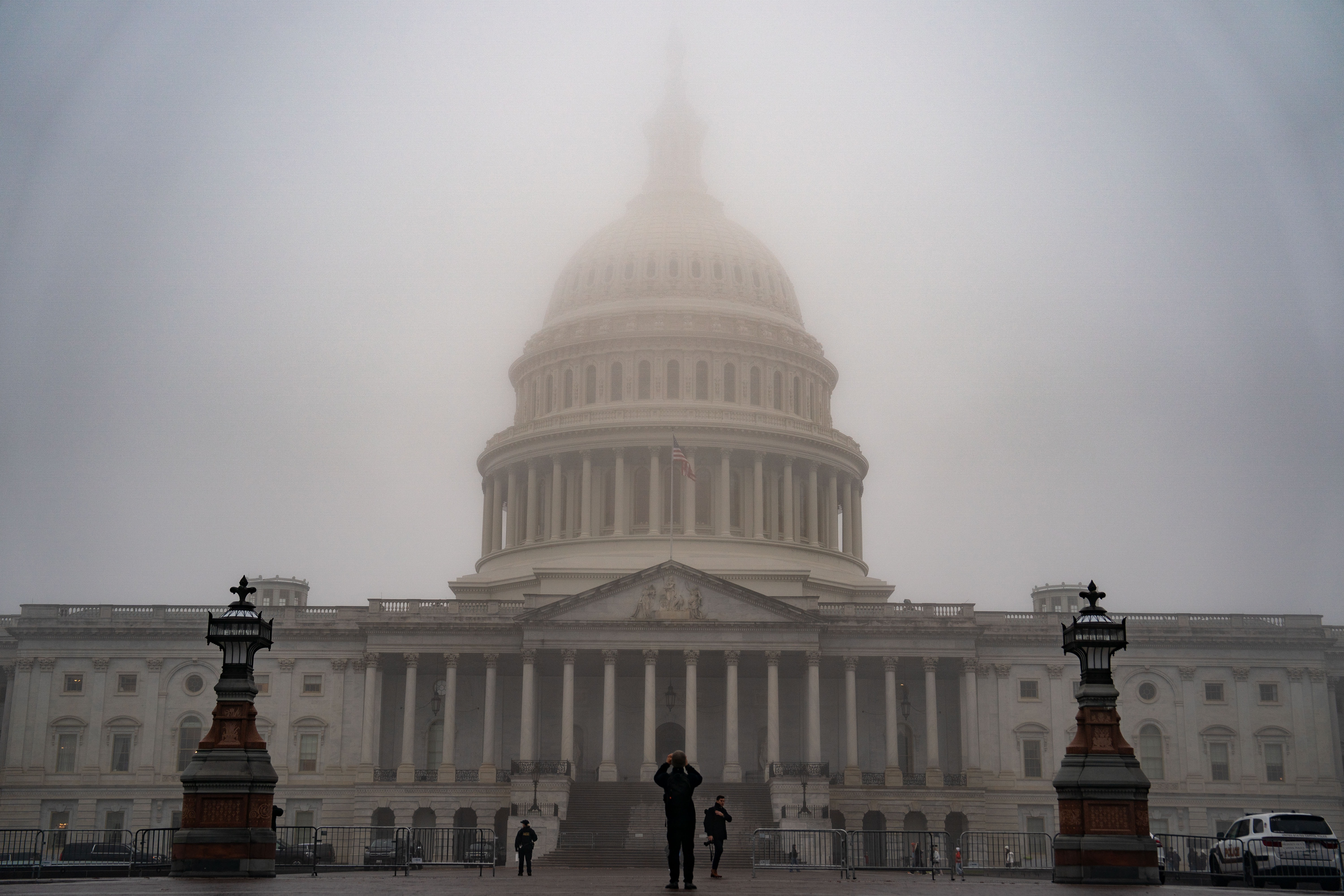 Fog hovers over the dome of the U.S. Capitol in Dec., 2024.