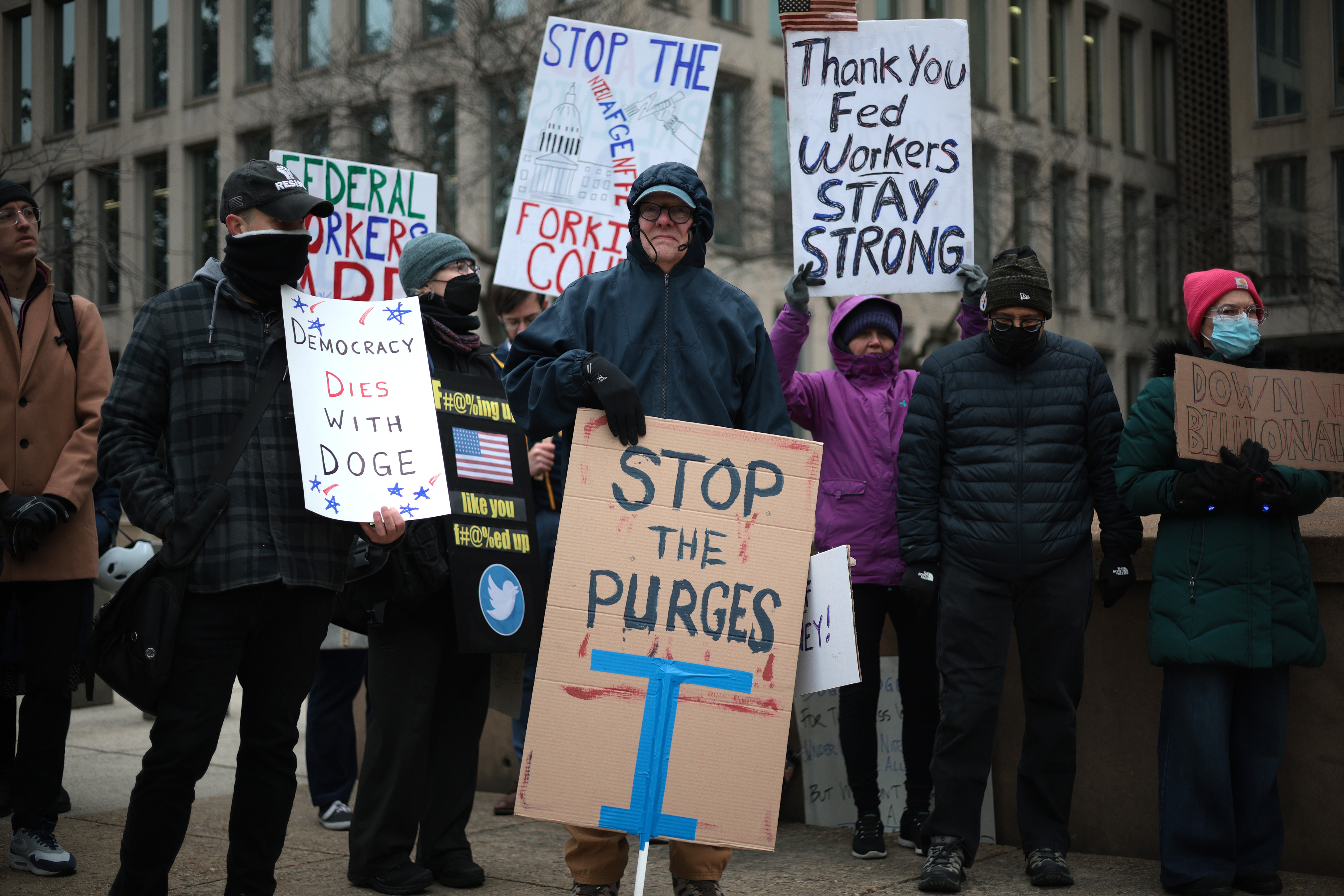 Protesters rally outside of the headquarters of the U.S. Office of Personnel Management on February 5, 2025 in Washington, D.C.