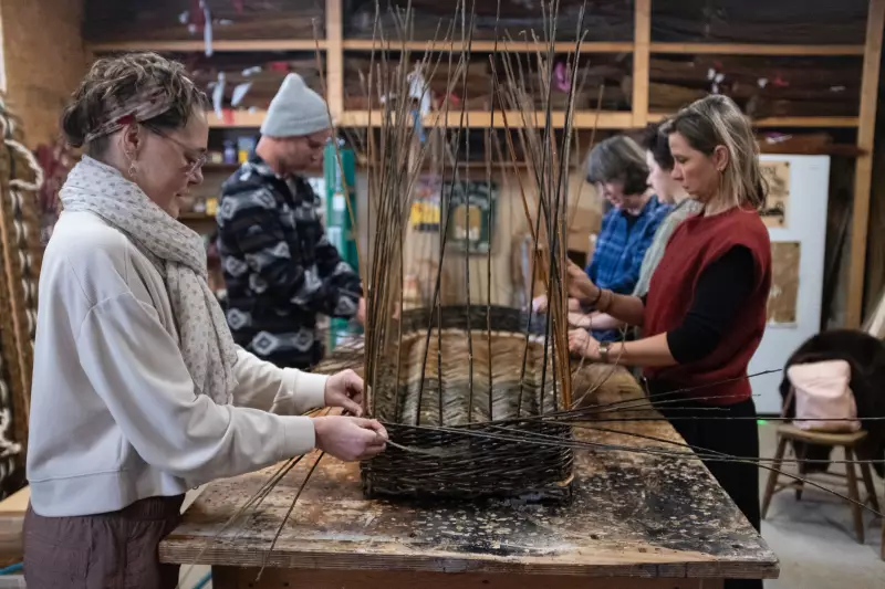 MaddyChristine Hope Brokopp and her friends weave the sides of the burial tray.
