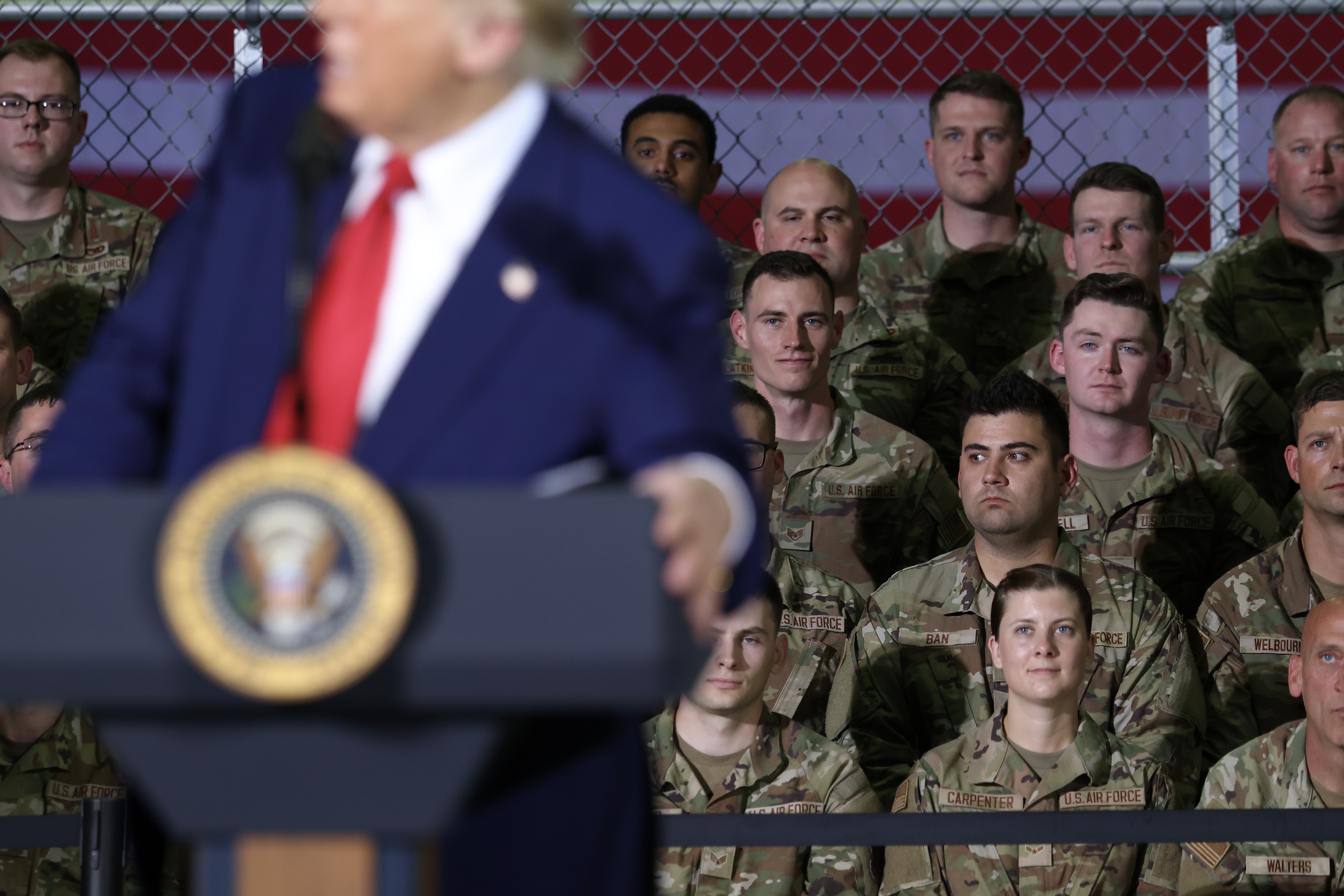 Michigan Air National Guard troops listen as President Trump speaks during a visit with Michigan Air National Guard Troops on April 29 at Selfridge Air National Guard Base, Mich.