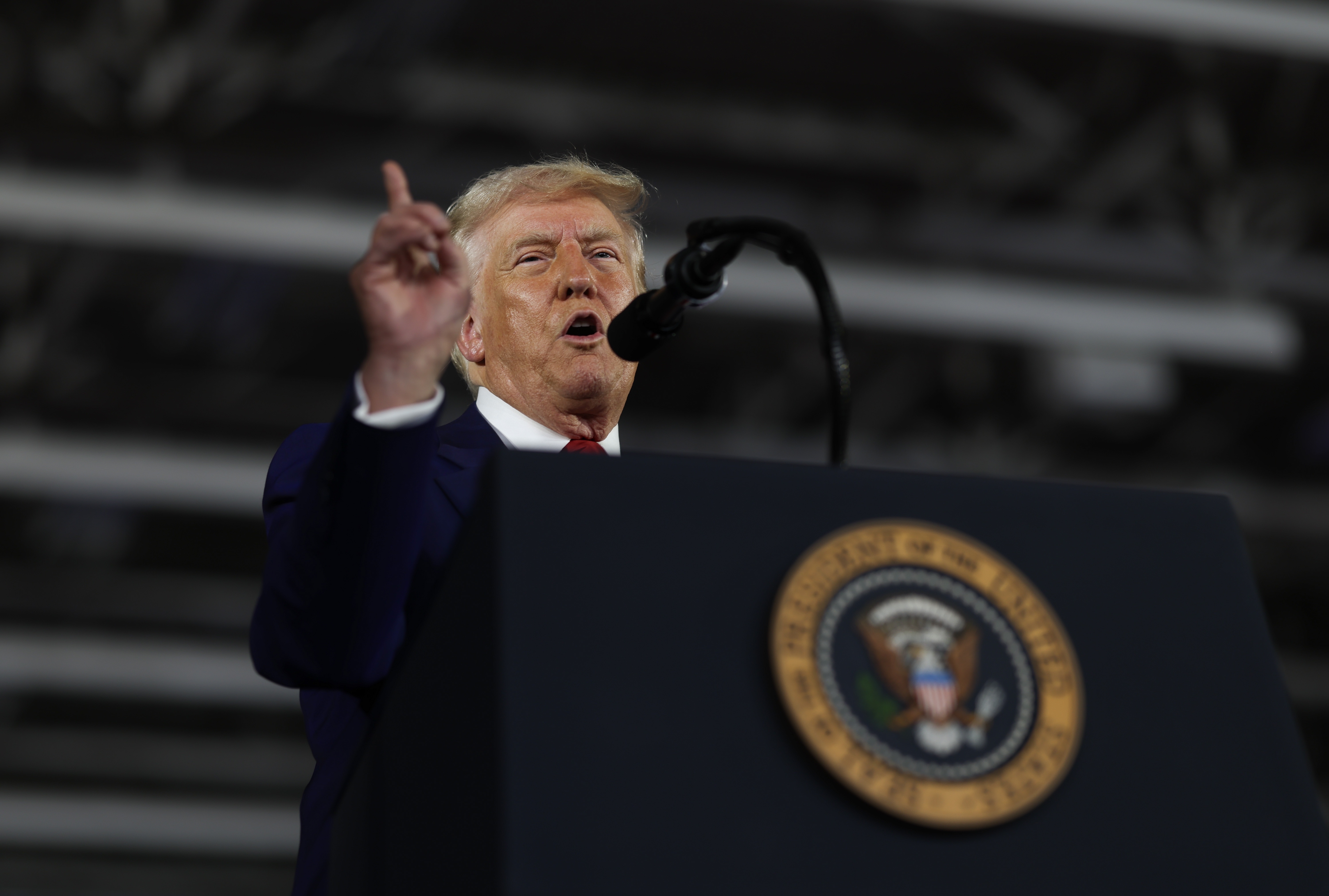 President Trump speaks during a rally at Macomb Community College on in Warren, Mich., on Tuesday to mark his first 100 days in office.