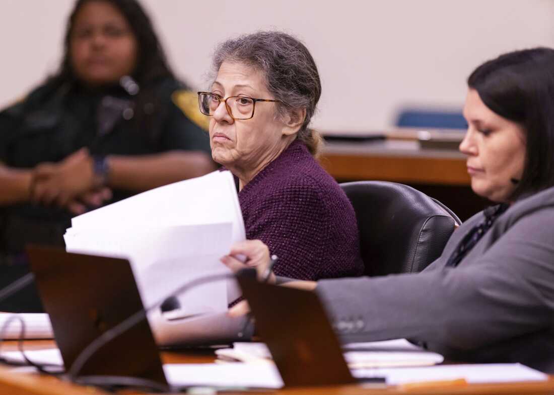 Susan Lorincz (left) listens to testimony during her trial Wednesday in Judge Robert Hodges' courtroom in Ocala, Fla., as her defense attorney Amanda Sizemore also listens.