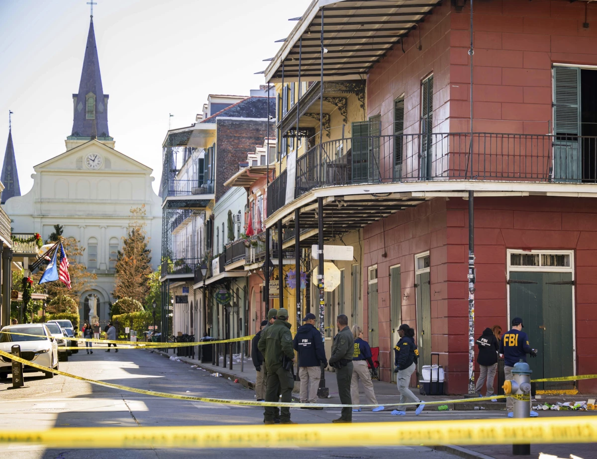 The FBI investigates the area on Orleans Street and Bourbon Street by St. Louis Cathedral in the French Quarter where a suspicious package was detonated after a person drove a truck into a crowd earlier on Bourbon Street on Wednesday, Jan. 1, 2025.