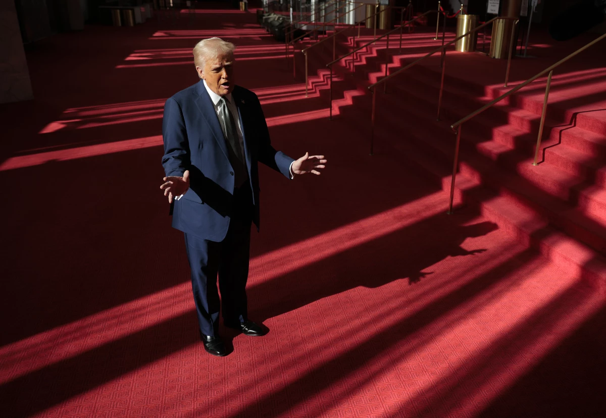 President Donald Trump talks to the media in the Hall of Nations at the John F. Kennedy Center for the Performing Arts on March 17, 2025 in Washington, D.C.