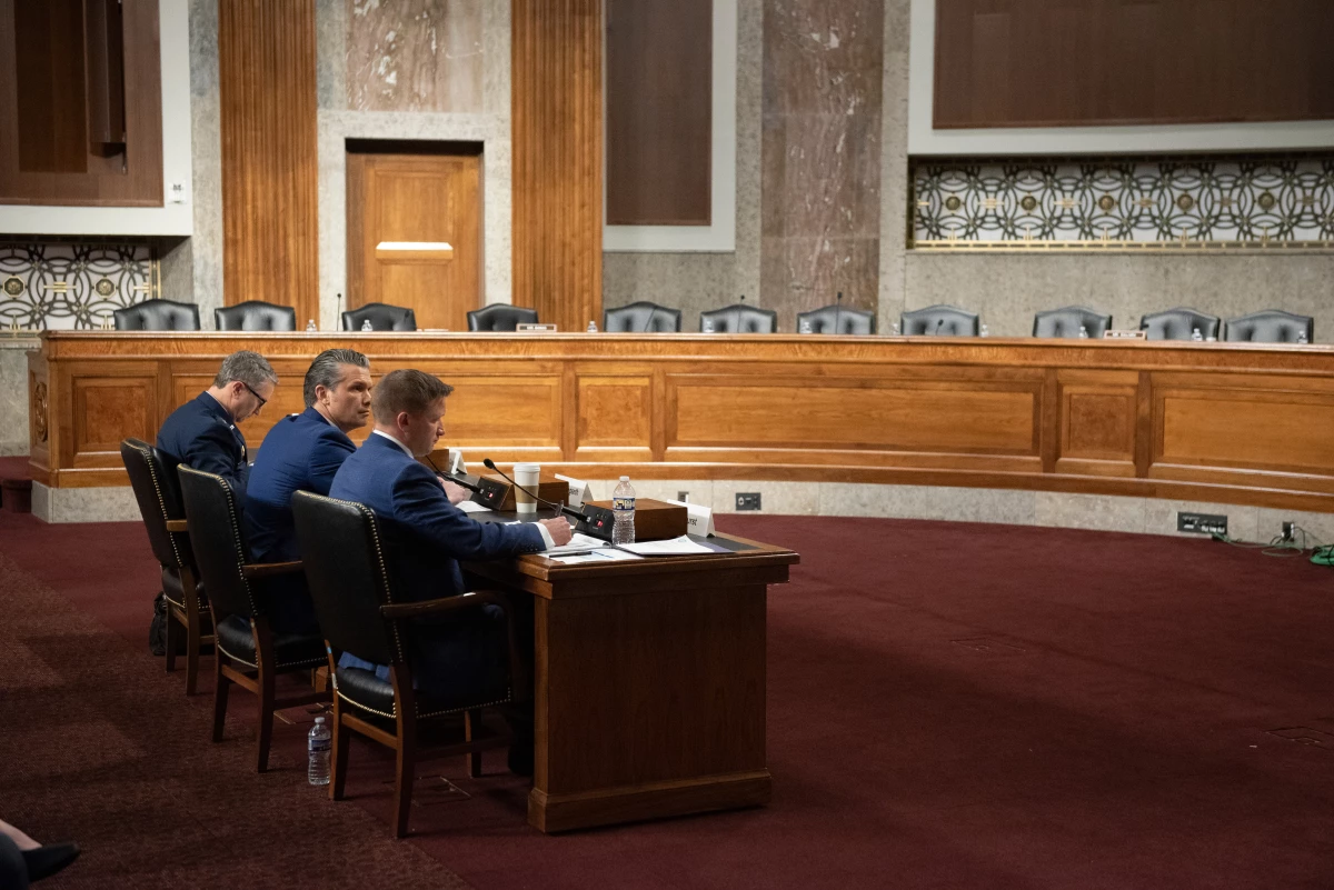 From l-r., Chairman of the Joint Chiefs of Staff Air Force Gen. Danial Caine, Secretary of Defense Pete Hegseth, and acting undersecretary of defense during the Senate Armed Services Committee hearing on the Department of Defense budget, on Capitol Hill, in Washington, Thursday, April 30, 2026.
