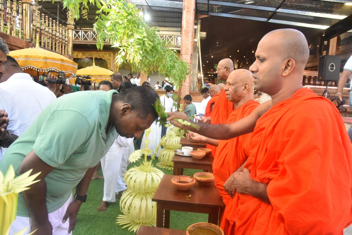 Being anointed with oil is part of the New Year's ceremony in mid-April for Buddhists and Hindus in Sri Lanka.