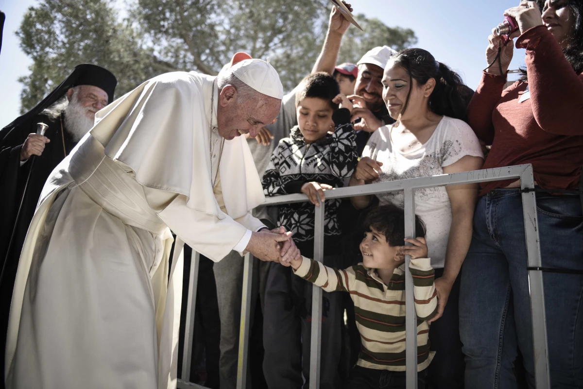 Pope Francis meets migrants at the Moria detention center on April 16, 2016, in Mytilene, Greece.
