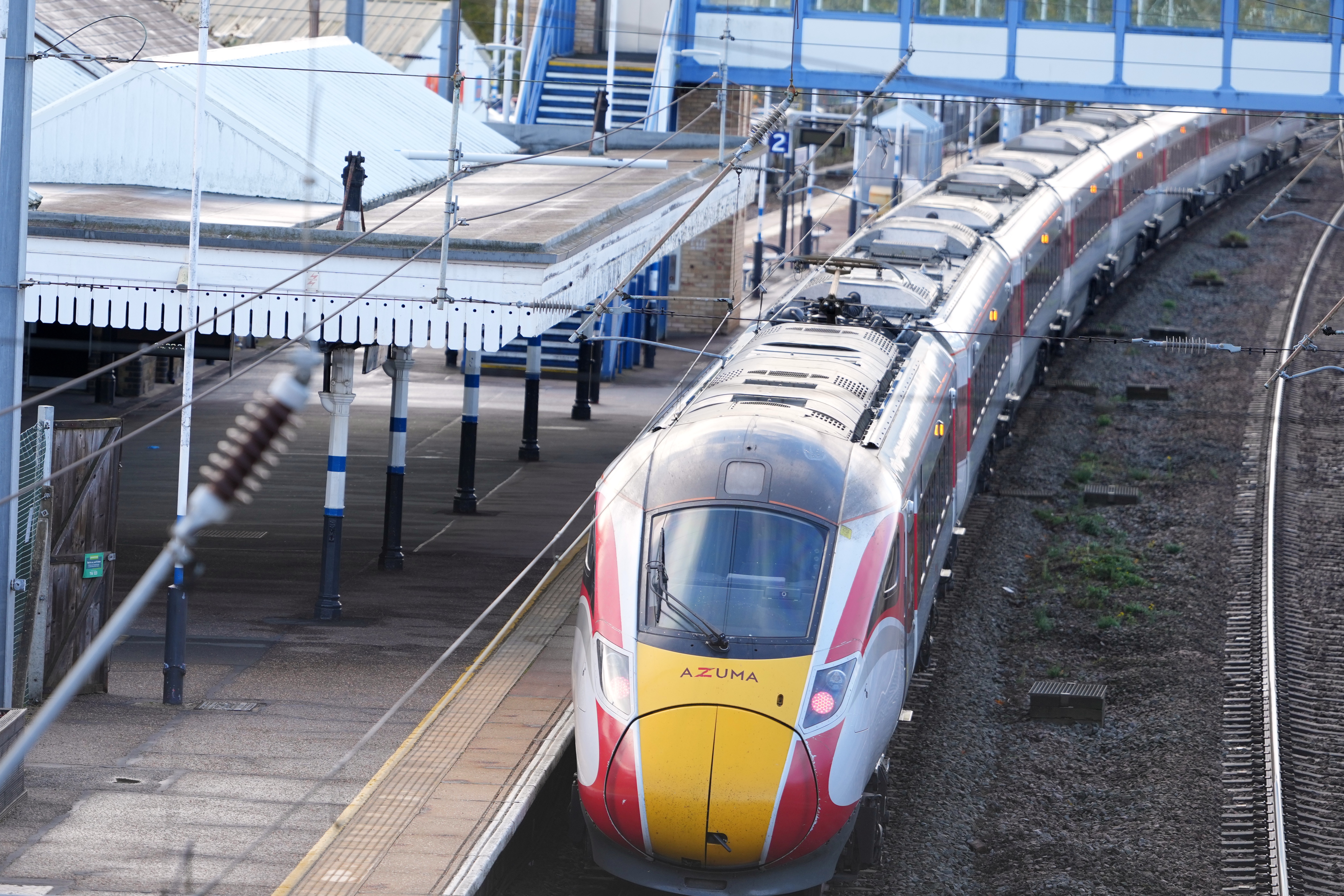 A train is parked at the station after a mass stabbing on a London-bound train in Huntingdon, England, Sunday, Nov. 2, 2025.