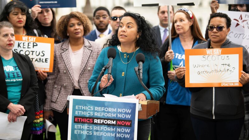 FILE - Analilia Mejia, center, speaks during a rally calling for SCOTUS ethics reform, May 2, 2023, in Washington.