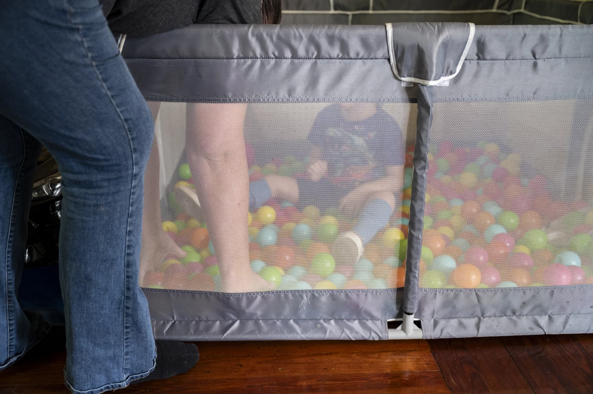 Sam, who has several disabilities, loves sensory play time in his homemade ball pit.