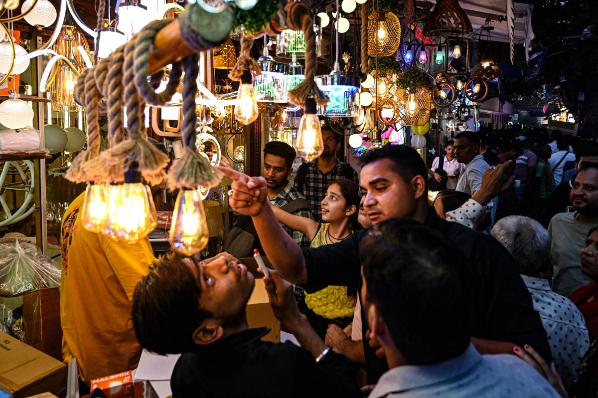 A huge crowd was seen at Bhagirath Palace on Oct. 27 in New Delhi, India, shopping for lights and lamps ahead of the Diwali Festival. The holiday is celebrated with many traditions and symbols.
