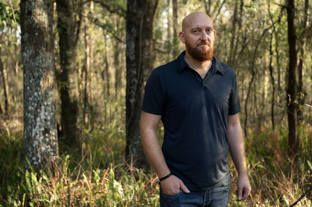 Wade Hanicker poses for a portrait at his home in Brooksville, Fla., on March 23. Hanicker was diagnosed with silicosis after years of cutting quartz countertops.