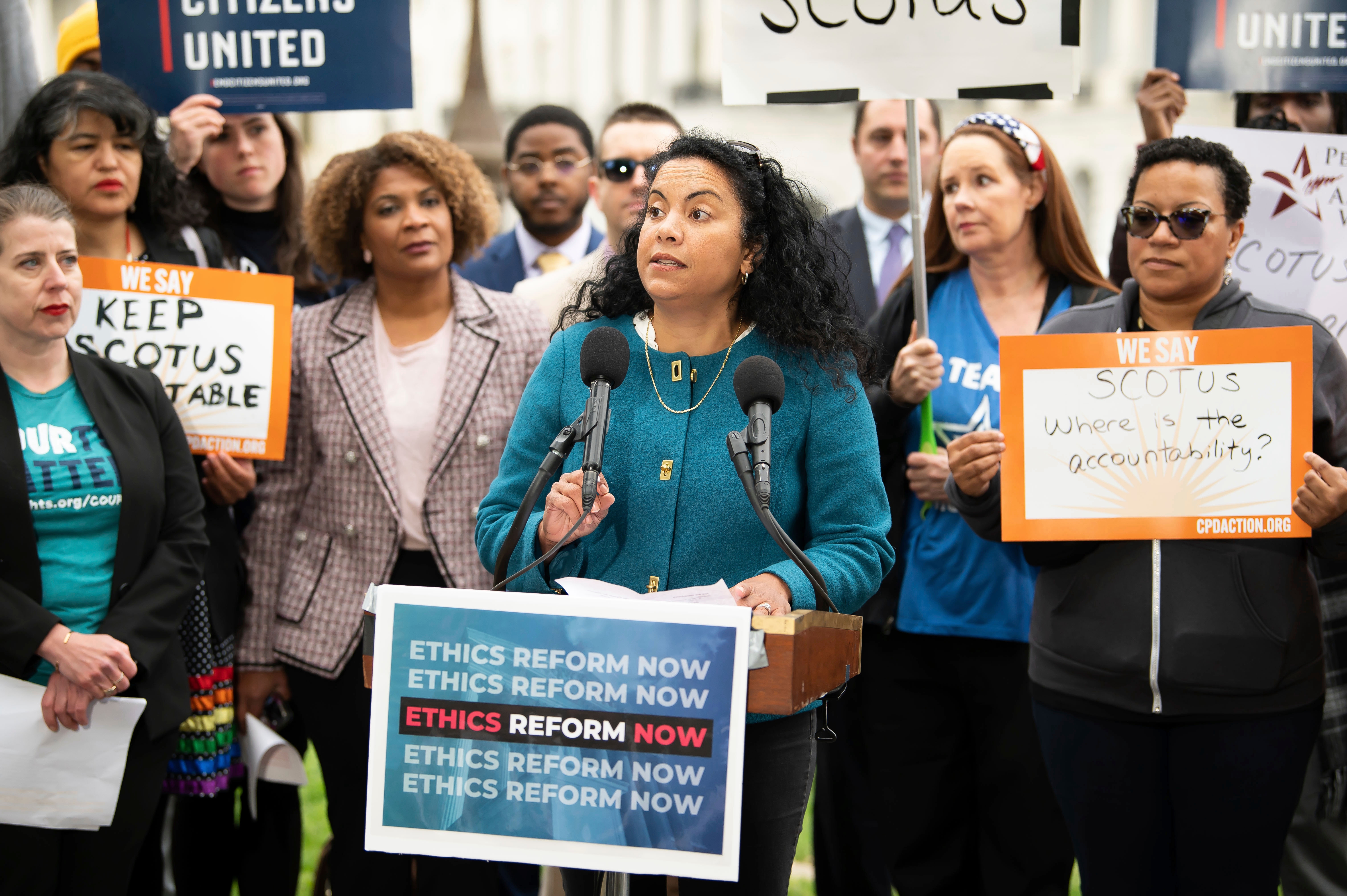 FILE - Analilia Mejia, center, speaks during a rally calling for SCOTUS ethics reform, May 2, 2023, in Washington.