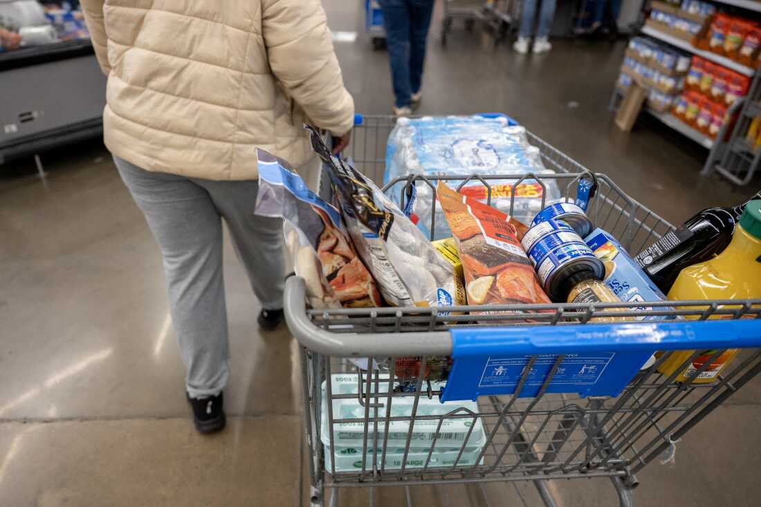 A customer shops at Walmart in Little Rock, Ark.