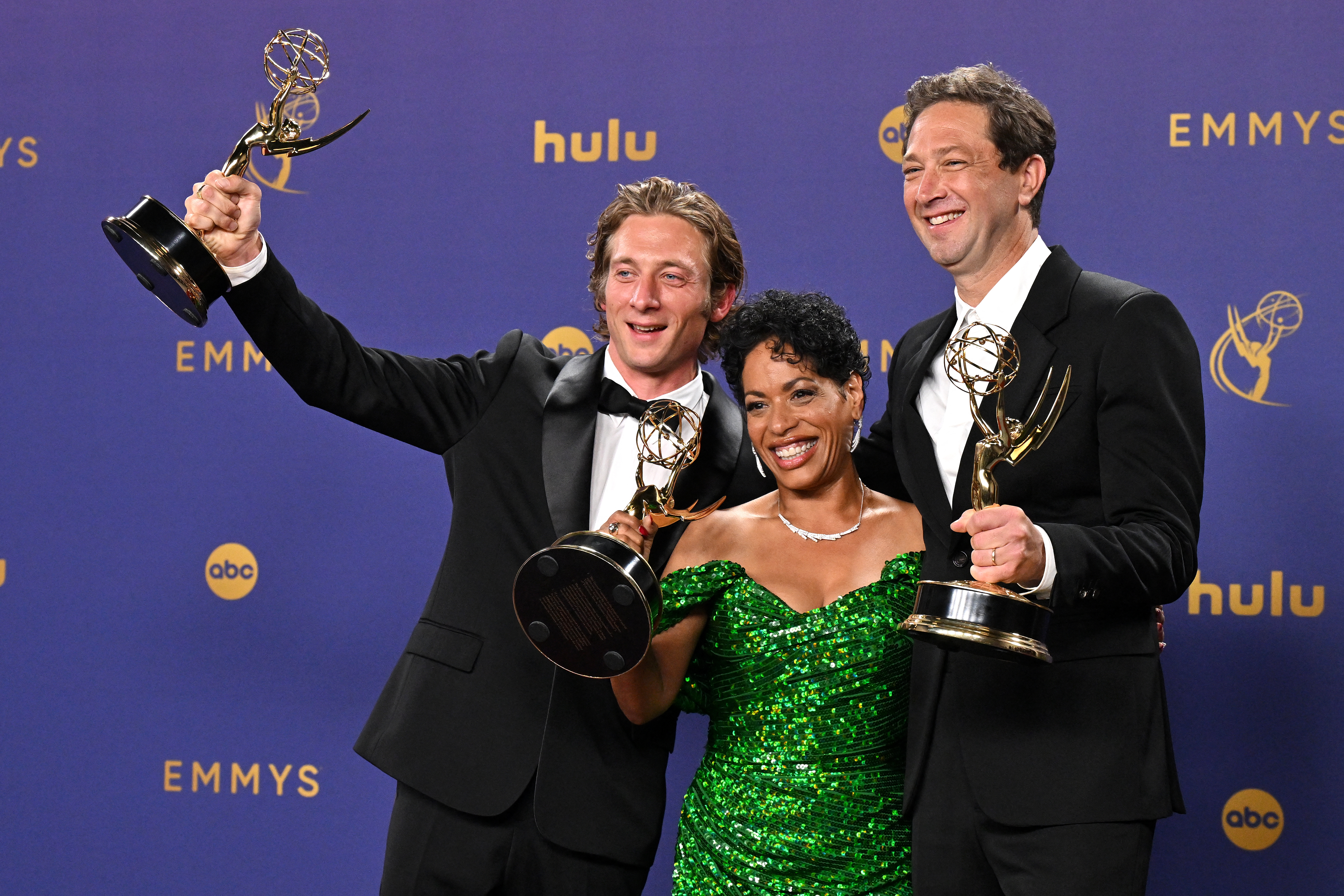 Jeremy Allen White (left), Liza Colón-Zayas and Ebon Moss-Bachrach of <em>The Bear</em> at the 76th Emmy Awards in Los Angeles.