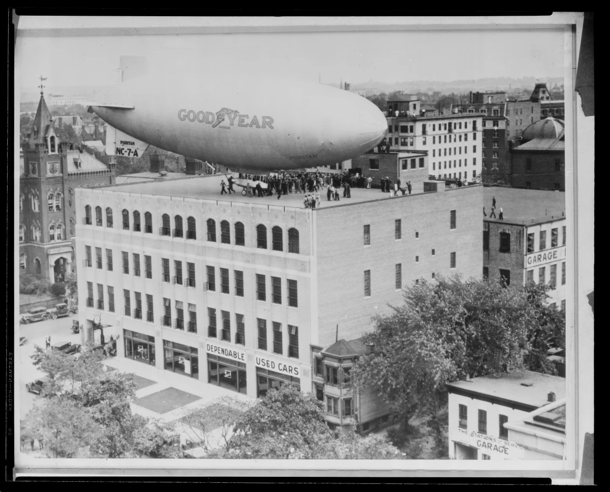 A Goodyear blimp lands on top of the Emerson & Orme building in Washington, D.C., in 1928 — one of the many publicity stunts the tire company undertook to draw attention to its brand.