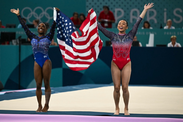 Olympic champion Simone Biles and bronze medalist Sunisa Lee of the U.S. celebrate after the gymnastics women's all around final during the Paris 2024 Olympic Games on Thursday.